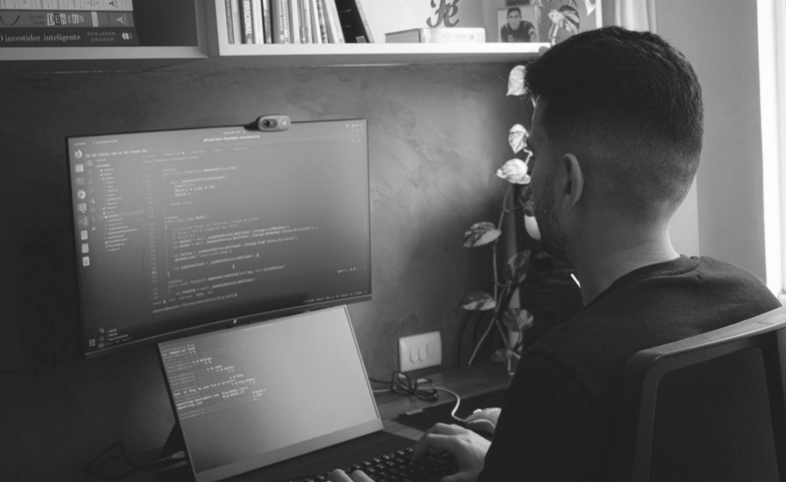 Team collaboration workspace with game development tools, sketches and testing devices